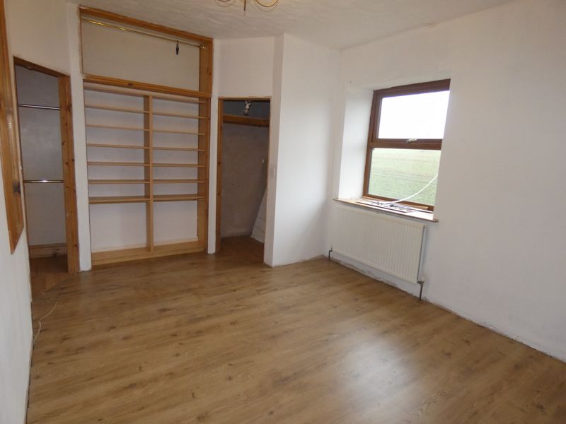 Bedroom One- click for photo gallery